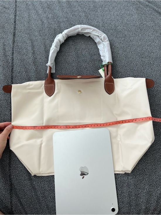 Longchamp Handbags - Longchamp Cream Tote with Brown Leather Handles